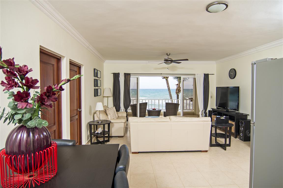 Spacious living room with ocean view at Beach Condos La Rinconada